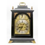 A George II ebonised and brass mounted eight day bracket clock, the dial inscribed W Tomlinson