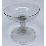 An late 16th/early 17th Century "Facon de Venise" wine glass with wide shallow bowl and hollow stem,
