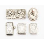 A late Victorian silver engraved vesta case, Birmingham, circa 1890 together with four various