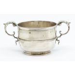 An Edwardian two handled loving cup, with central mid rib, by Atkin Brothers, Sheffield, 1907, 5.