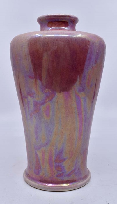 Ruskin Pottery: A Ruskin Pottery shouldered baluster vase with high fired pink lustre glaze,