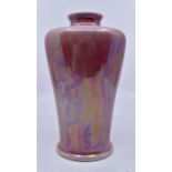 Ruskin Pottery: A Ruskin Pottery shouldered baluster vase with high fired pink lustre glaze,