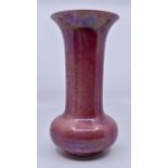 Ruskin Pottery: A Ruskin Pottery pink lustre glaze long neck globe and shaft vase, height approx