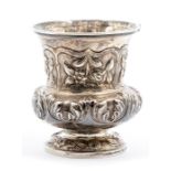 A William IV silver campana shaped goblet, the body chased with panels of floral decoration, on