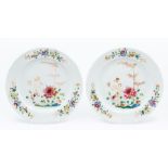 A pair of Chinese famille verte plates, decorated with flowers, one with attached Copenhagen