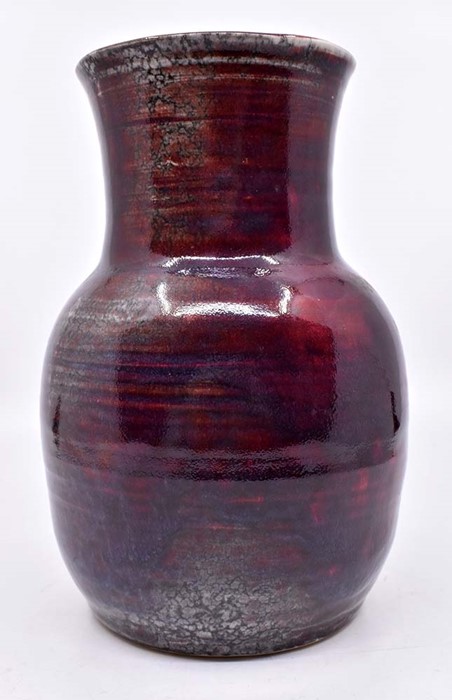 Ruskin Pottery: A Ruskin Pottery baluster vase with sang de boeuf with silver/grey highlights,