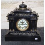 A 19th century architectural form black slate mantle clock with American eight day gong striking