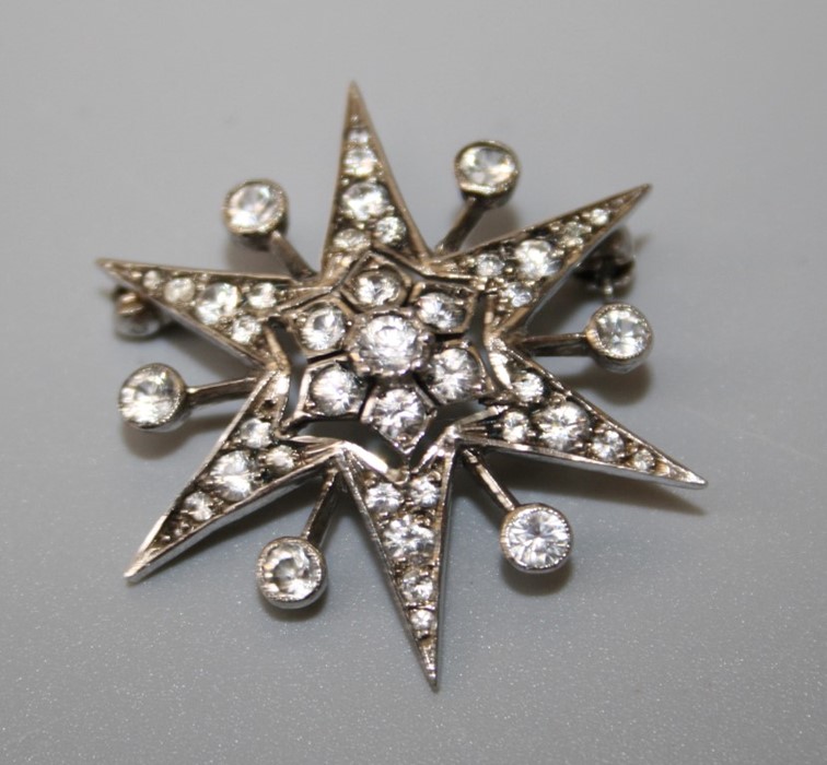 A white topaz star brooch circa 1900, probably platinum