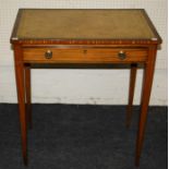 A Geo III leather inset, ebony strung satinwood and mahogany writing table with single froeze