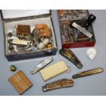 A small collection of pen and pocket clasp knives, miniature lead figures, treen bell pulls and