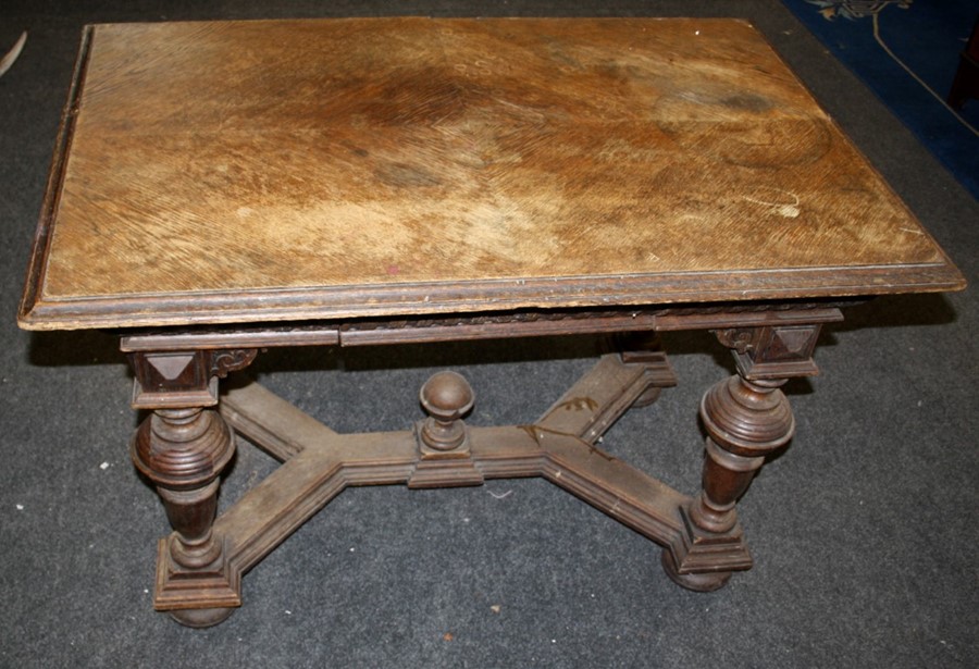 A Dutch oak 17th century style centre table with shaped bulbous legs. 116cm wide