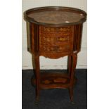 A French Louis XVI style marquetry inlaid kingwood pettit commode with gallery top and fitted