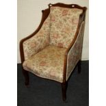 An Edwardian satin wood strung mahogany scroll back salon armchair with stuff over upholstery and