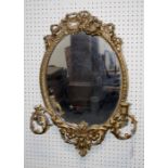 A 19th century giltwood and gesso girondole wall mirror with a ribbon tied florally decorated