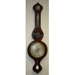 A 19th century rosewood onion top wheel barometer with silvered gauges and dial. 95 cms.