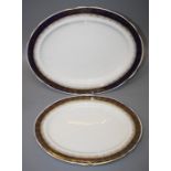 A "Paragon" part dinner service with cobalt and gilt detail to the rim.
