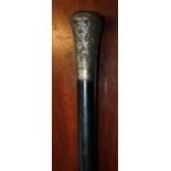A late 19th century gentleman's ebony evening cane with unmarked florally chased silver handle. 90
