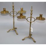A pair of 19th century brass two sconce height adjustable table candlesticks, each with wrythen