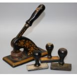 An early 20th century Jordans & Sons jappaned metal letter embosser, producing the legend "