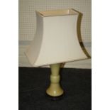 A Chinese Gu shape yellow ground table lamp with  pierced hardwood stand and silk shade. 34 cms (
