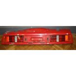 A rear light panel from a Lotus Esprit. 154 cms wide. Bulb housings and some wiring remaining,