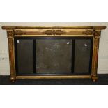 A 19th century giltwood and gesso overmantle mirror, the tied reed frame enclosing an ebonised