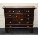 A 19th century mahogany crossbanded, oyster veneer chest, the associated top over an arrangement