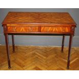 An early 19th century style yew wood and mahogany library table, the parquetry box strung