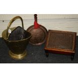 A Victorian mahogany foot warming stool with tin liner and cane upholstered sloping hinged cover,