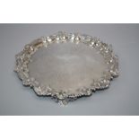 A Victorian silver salver engraved with daiper reserves around stag coronet crest within a scalloped