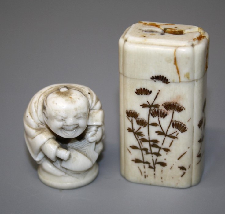 A Japanese Meiji ivory stopper carved as a Shokunin, together with an ivory toothpick holder (a/