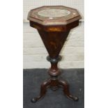 A Victorian walnut trumpet shape work table with later embellishments, containing various sewing