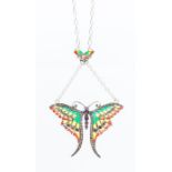 A silver and plique a jour butterfly pendant, the body set with ruby, the wings set with rubies