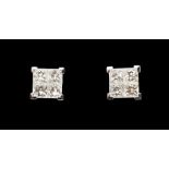 A pair of diamond and 18ct white gold earrings, each earring invisible set with four princess cut