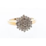 A diamond and 9ct gold hexagonal shaped cluster ring, claw set with round brilliant cut diamonds,