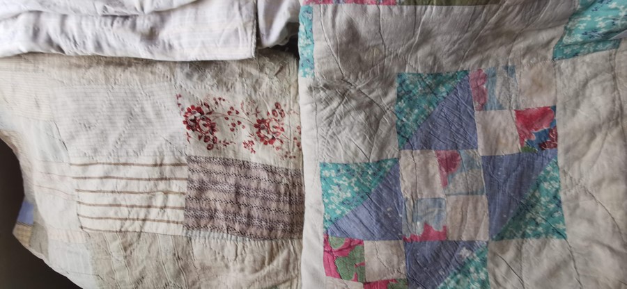 A large faded stained Victorian quilt in assorted colours, plain lining with holes; a colourful - Image 2 of 3