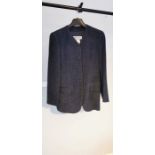 A ladies Cerruti jacket in black with sparkly thread throughout in manmade fibres, size UK10.