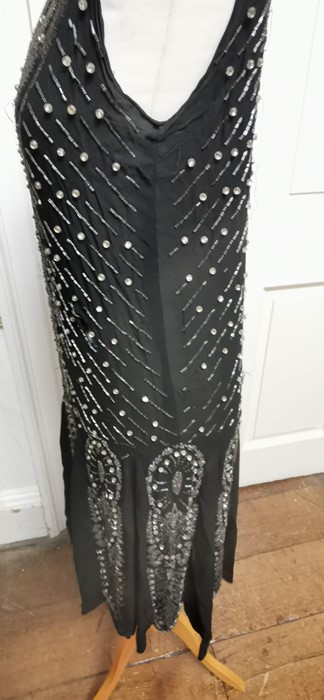 A black beaded Art Deco 1920s dress, this iconic dress is embellished in silver and black bugle - Image 13 of 14