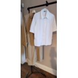 A Givenchy blouse, white cotton, Paris label, but made in Italy, cottage concealed buttons down