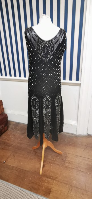 A black beaded Art Deco 1920s dress, this iconic dress is embellished in silver and black bugle - Image 3 of 14