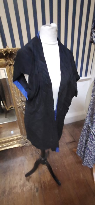 an Issy Miyake (Paris) black bolero in silk edged in 1980/90s with cobalt blue trimming.