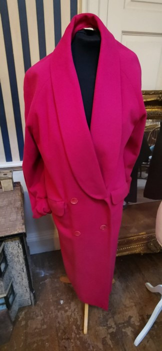 A raspberry pink Christian Dior full length coat with cowl collar with 4 bottoms and flat pockets,