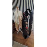 A late 1920s shawl and a 1930s shawl, large. One black with colourful embroidery and another in