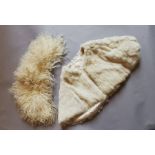 A curly sheepskin collar off a child's coat 1920's and a white fur child's cape fully lined in satin