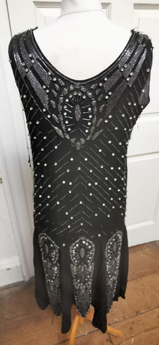 A black beaded Art Deco 1920s dress, this iconic dress is embellished in silver and black bugle - Image 11 of 14