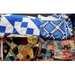 A large patchwork throw in an array of patterns and colourways, in a large throw design with a