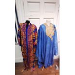 From the wardrobe of Opera singer Jessye Norman. vibrant blue and gold kaftan by Ruth Norman New