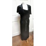 An iconic Balenciaga, 1930s evening dress and bolero, in black silk velvet in a ribbed pattern,