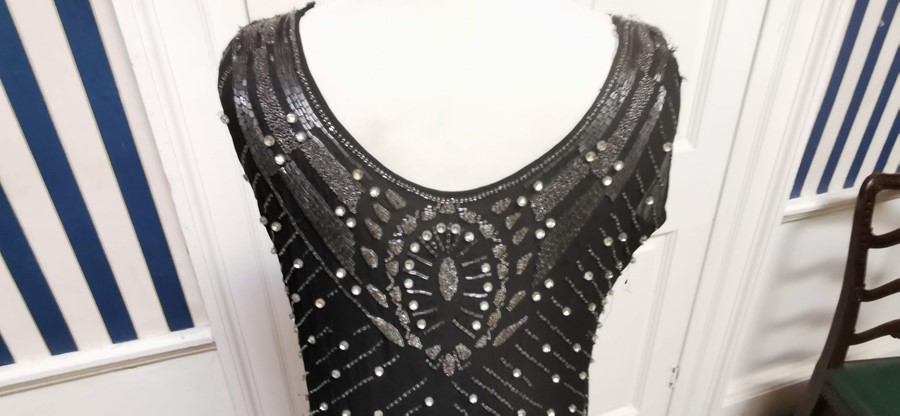 A black beaded Art Deco 1920s dress, this iconic dress is embellished in silver and black bugle - Image 10 of 14