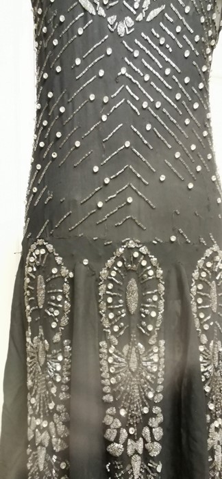 A black beaded Art Deco 1920s dress, this iconic dress is embellished in silver and black bugle - Image 12 of 14